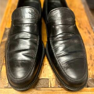 Men’s Tod’s black leather loafers